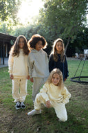 Штани на резинці кольору сірий меланж